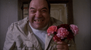 Sam-Raimi-Crimewave-Paul-L-Smith-Faron-Crush-flowers
